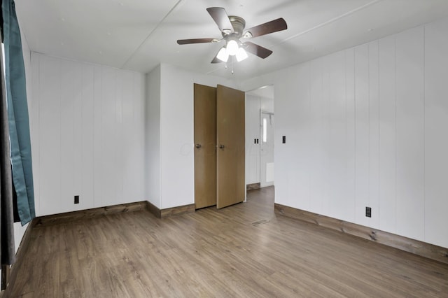 19 E 1st St, The Plains, OH 45780 - unfurnished room with wood finished floors and ceiling fan