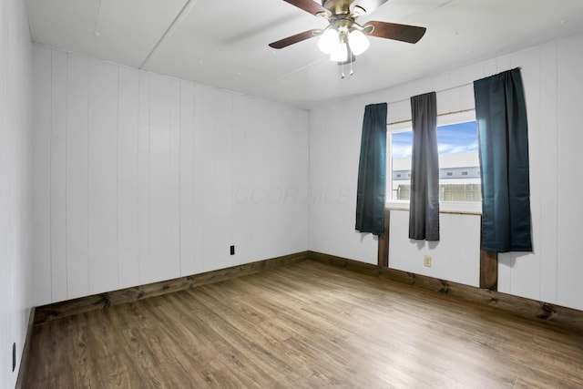 19 E 1st St, The Plains, OH 45780 - empty room with wood finished floors and ceiling fan