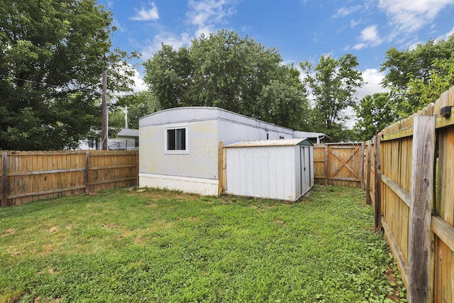 19 E 1st St, The Plains, OH 45780 - fenced backyard with a storage shed and a gate