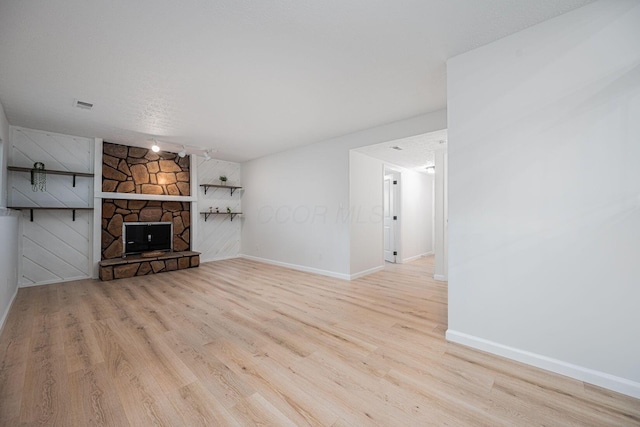 260 Old Coach Pl, Canal Winchester, OH 43110 - unfurnished living room with wood finished floors and a fireplace