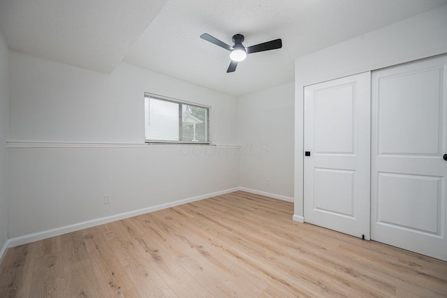 260 Old Coach Pl, Canal Winchester, OH 43110 - unfurnished bedroom with light wood-type flooring, a closet, and a ceiling fan