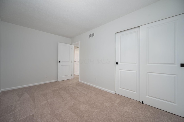 260 Old Coach Pl, Canal Winchester, OH 43110 - unfurnished bedroom featuring light carpet and a closet