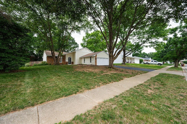 260 Old Coach Pl, Canal Winchester, OH 43110 - view of front of home with an attached garage and asphalt driveway