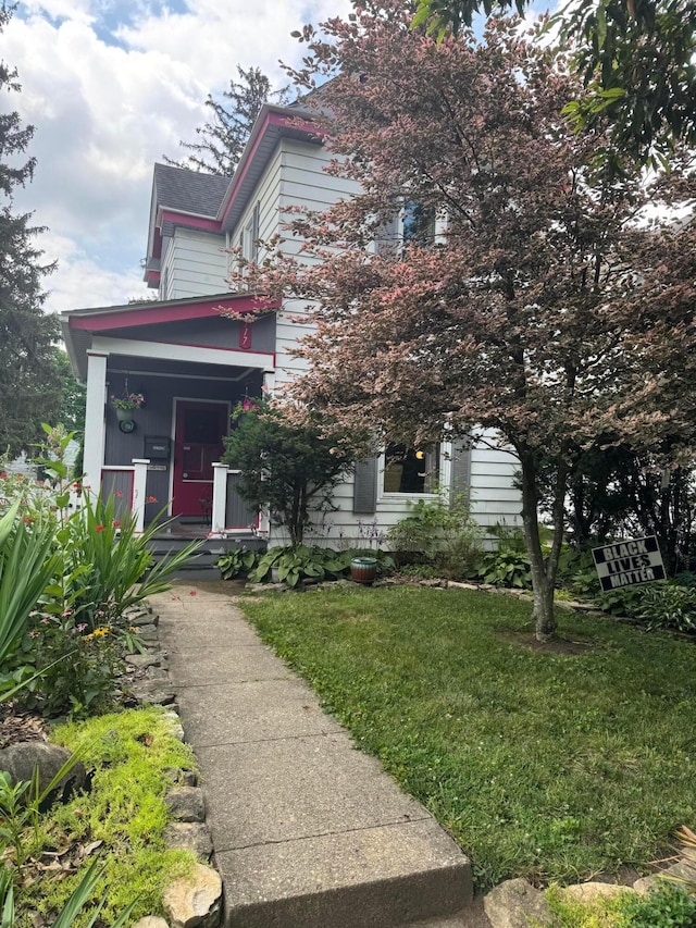 117 W Como Ave, Columbus, OH 43202 - view of front of house featuring covered porch and a front yard