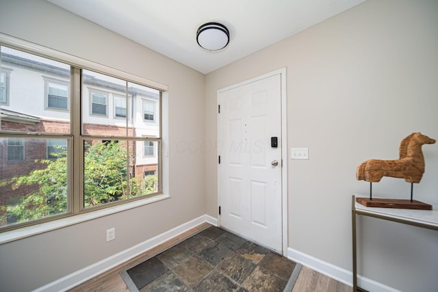 29 Victorian Gate Way, Columbus, OH 43215 - foyer entrance with baseboards and dark stone finish floors