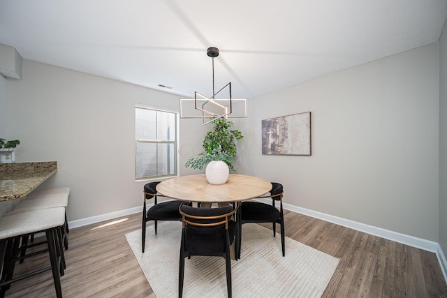 29 Victorian Gate Way, Columbus, OH 43215 - dining room featuring a chandelier and wood finished floors