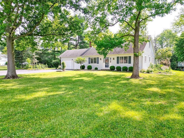 7860 Peter Hoover Rd, New Albany, OH 43054 - view of front facade with an attached garage, a front yard, driveway, and a chimney