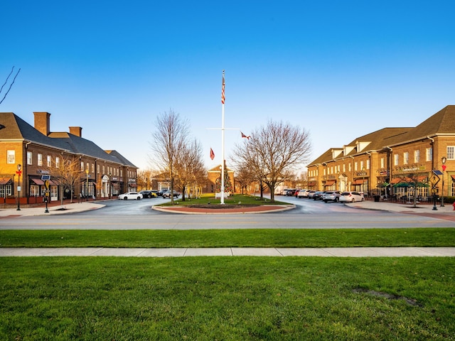 5650 Harlem Rd, New Albany, OH 43054 - view of road with sidewalks, traffic signs, and street lights