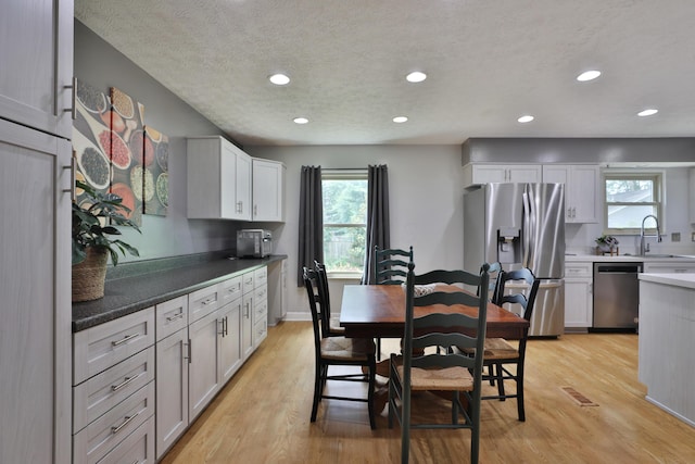 677 Fallside Ln, Westerville, OH 43081 - dining area with plenty of natural light, recessed lighting, and light wood-style floors