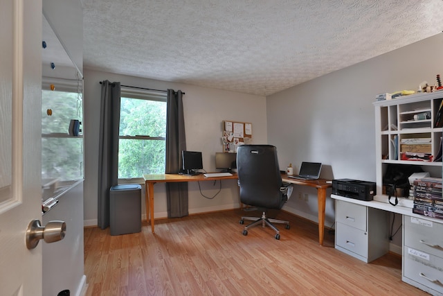 677 Fallside Ln, Westerville, OH 43081 - home office featuring light wood finished floors and a textured ceiling