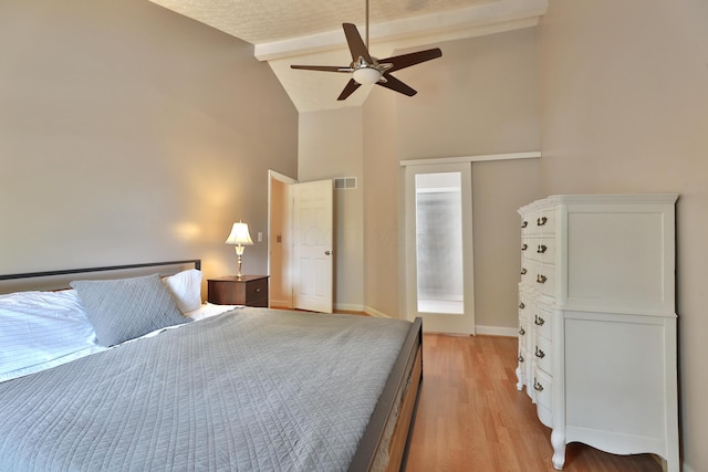 677 Fallside Ln, Westerville, OH 43081 - bedroom with beamed ceiling, light wood-style floors, high vaulted ceiling, and ceiling fan
