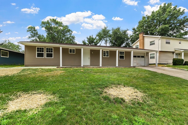 303 Rocky Fork Dr N, Columbus, OH 43230 - view of front facade featuring an attached garage, driveway, a front lawn, and covered porch