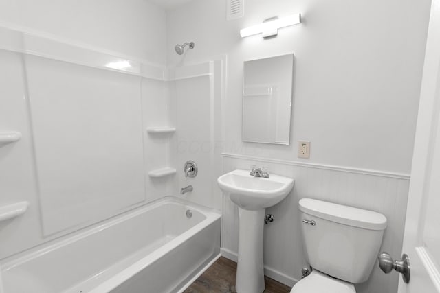 303 Rocky Fork Dr N, Columbus, OH 43230 - full bathroom featuring  shower combination, wood finished floors, and wainscoting