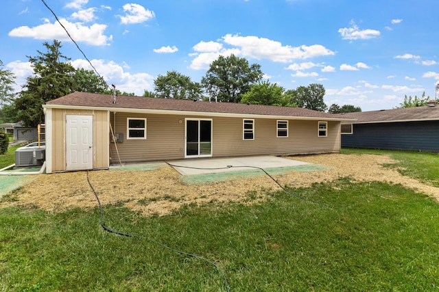 303 Rocky Fork Dr N, Columbus, OH 43230 - rear view of house featuring a patio and a yard