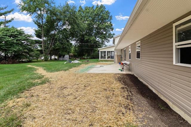 303 Rocky Fork Dr N, Columbus, OH 43230 - view of green lawn with a patio area