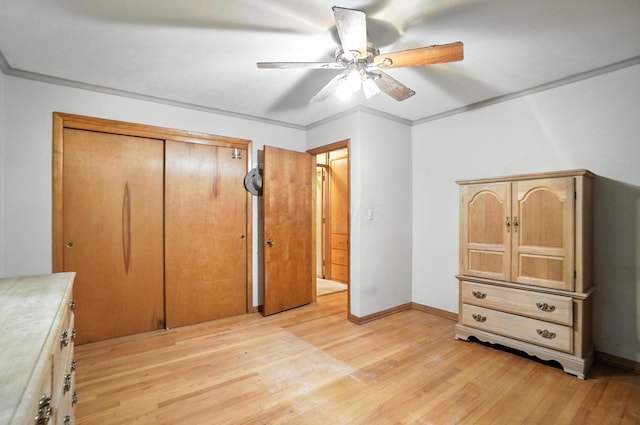5050 Bixby Rd, Groveport, OH 43125 - unfurnished bedroom with light wood-type flooring, a closet, and ceiling fan