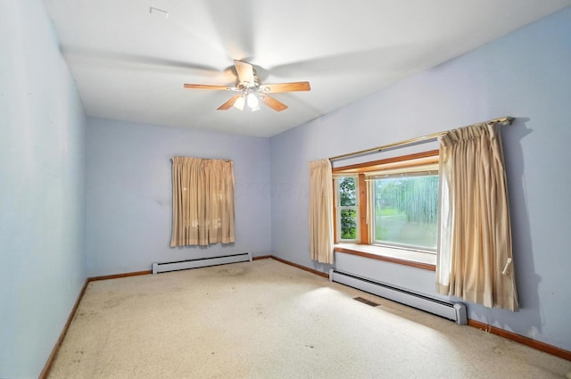5050 Bixby Rd, Groveport, OH 43125 - carpeted empty room with a baseboard heating unit and a ceiling fan