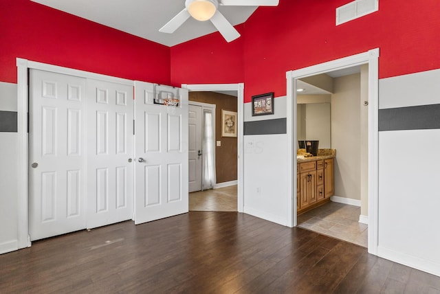 2919 Laurel Wind Blvd, Lewis Center, OH 43035 - unfurnished bedroom featuring wood finished floors, a closet, and a ceiling fan
