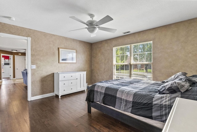 2919 Laurel Wind Blvd, Lewis Center, OH 43035 - bedroom with wood-type flooring, ceiling fan, and a textured ceiling