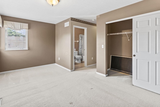 2919 Laurel Wind Blvd, Lewis Center, OH 43035 - unfurnished bedroom featuring light colored carpet, a closet, and connected bathroom