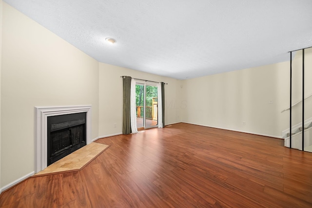 3254 Brookview Way Unit 15, Columbus, OH 43221 - unfurnished living room with a fireplace with flush hearth and wood finished floors