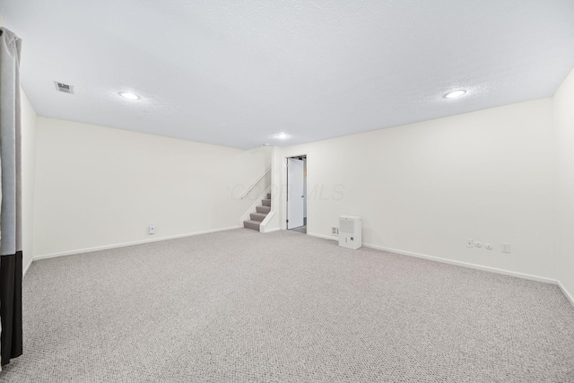 3254 Brookview Way Unit 15, Columbus, OH 43221 - finished basement with stairs, recessed lighting, carpet, and a textured ceiling