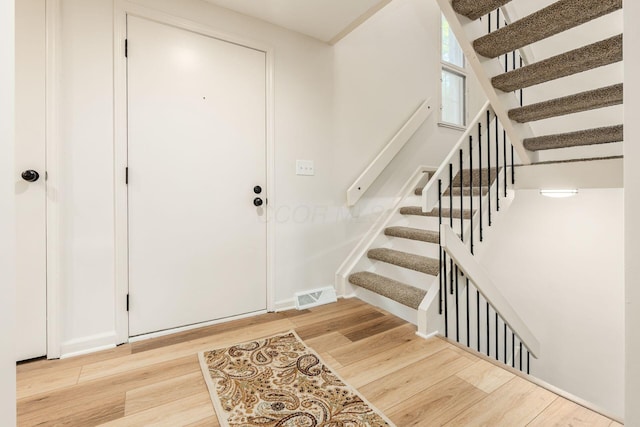 5110 Schuylkill St Unit 33-10, Columbus, OH 43220 - entryway with wood finished floors and stairway