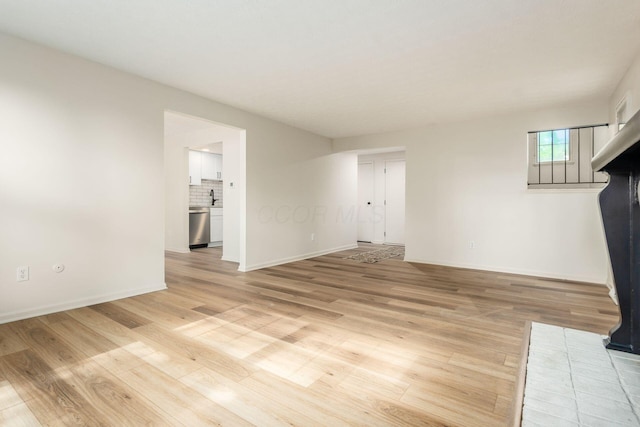 5110 Schuylkill St Unit 33-10, Columbus, OH 43220 - unfurnished living room with light wood-style flooring