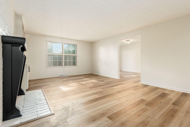 5110 Schuylkill St Unit 33-10, Columbus, OH 43220 - unfurnished living room with light wood-style flooring and baseboards