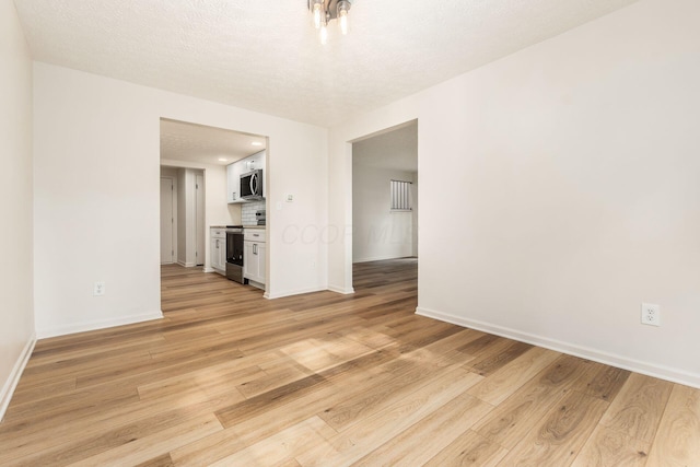 5110 Schuylkill St Unit 33-10, Columbus, OH 43220 - unfurnished living room featuring light wood-style floors