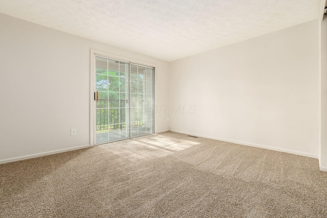 5110 Schuylkill St Unit 33-10, Columbus, OH 43220 - carpeted spare room with baseboards and a textured ceiling