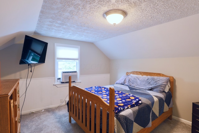 822 Rutter Ave, Lancaster, OH 43130 - carpeted bedroom with cooling unit, a textured ceiling, vaulted ceiling, and wainscoting