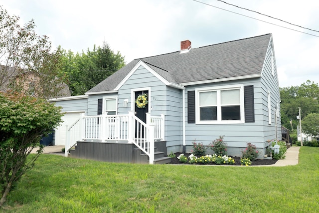 822 Rutter Ave, Lancaster, OH 43130 - view of front of house with a chimney, a garage, a shingled roof, and a front yard