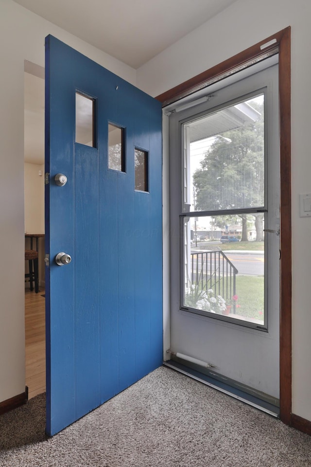 69 Morse Rd, Columbus, OH 43214 - doorway featuring carpet