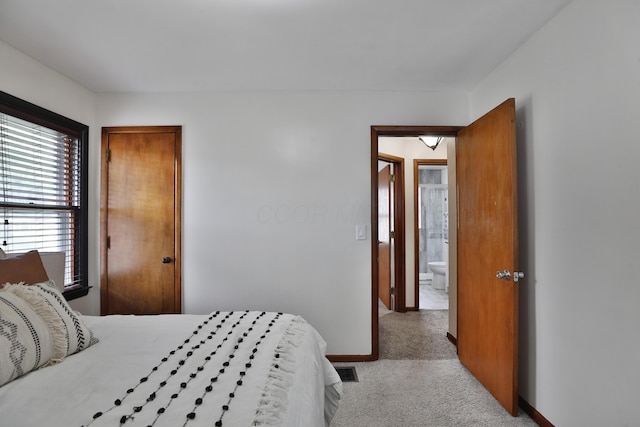 69 Morse Rd, Columbus, OH 43214 - bedroom featuring light colored carpet and baseboards