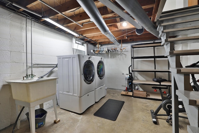 69 Morse Rd, Columbus, OH 43214 - laundry room with washing machine and dryer and concrete block wall