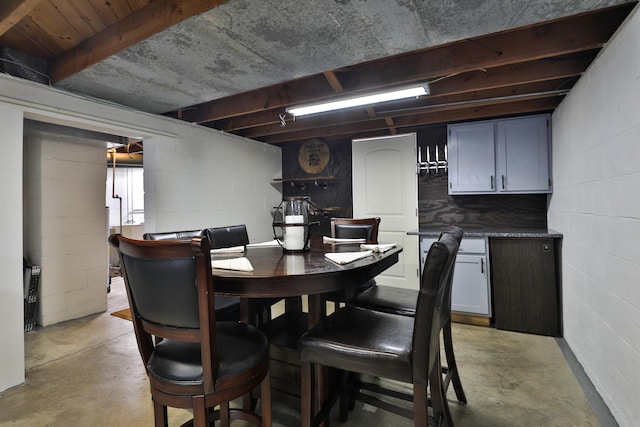 69 Morse Rd, Columbus, OH 43214 - dining area featuring concrete flooring and concrete block wall