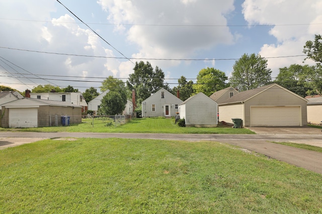69 Morse Rd, Columbus, OH 43214 - view of front of house featuring an outbuilding and a garage
