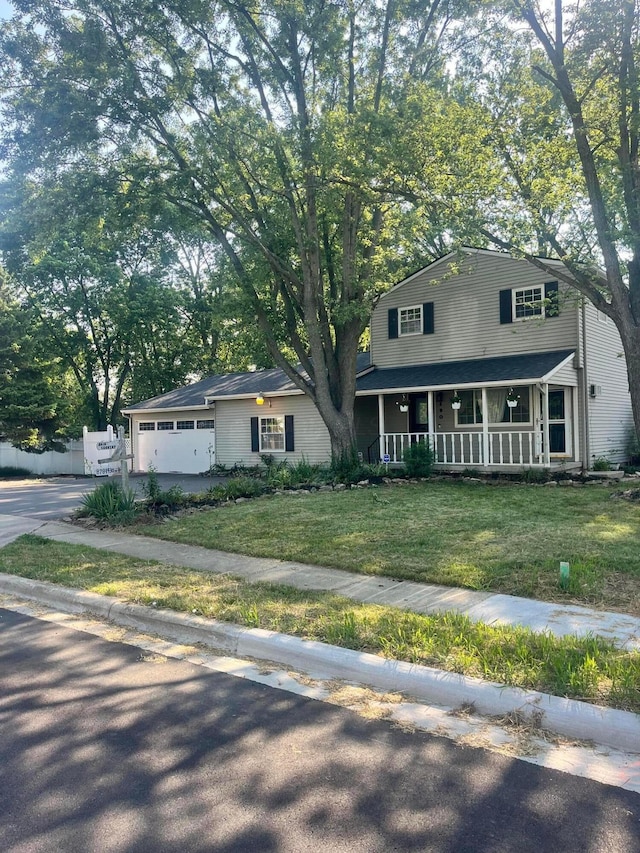 190 Inah Ave, Columbus, OH 43228 - view of front facade with a porch and driveway