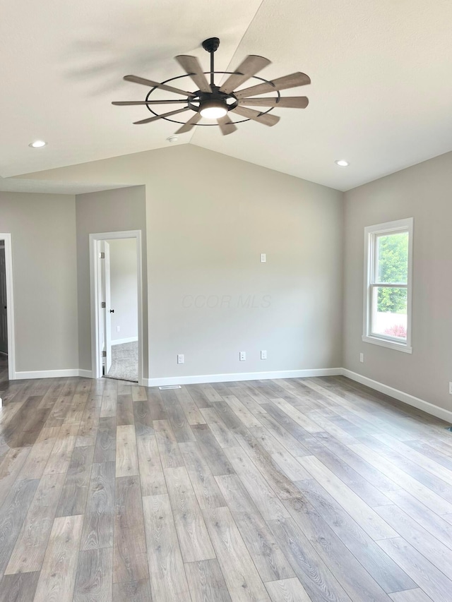 32366 Lilac Ln, Logan, OH 43138 - spare room featuring ceiling fan, hardwood / wood-style floors, recessed lighting, and vaulted ceiling