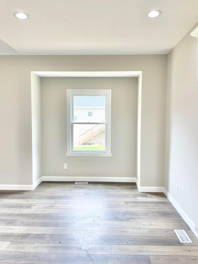 32366 Lilac Ln, Logan, OH 43138 - spare room featuring wood finished floors and recessed lighting