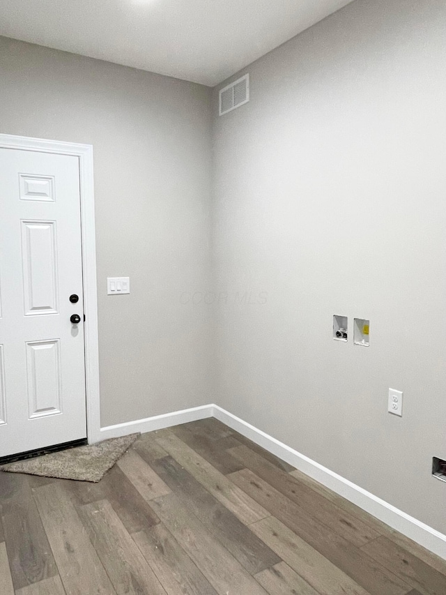 32366 Lilac Ln, Logan, OH 43138 - washroom featuring hookup for a washing machine and wood finished floors