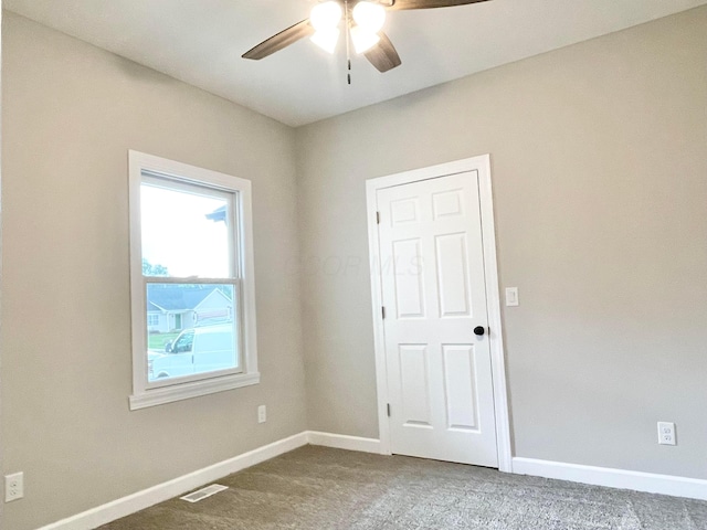 32366 Lilac Ln, Logan, OH 43138 - carpeted spare room featuring a ceiling fan and baseboards