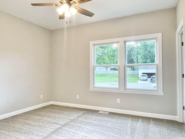 32366 Lilac Ln, Logan, OH 43138 - carpeted spare room with baseboards and ceiling fan