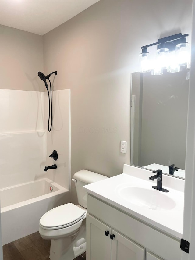 32366 Lilac Ln, Logan, OH 43138 - bathroom with vanity, shower / bathtub combination, and wood finished floors