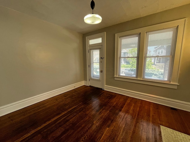 2395 Summit St, Columbus, OH 43202 - foyer entrance with dark wood finished floors and baseboards