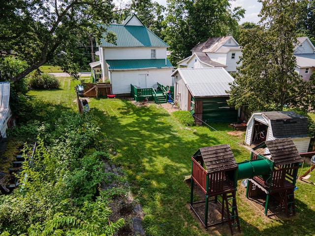 83 2nd St, Shelby, OH 44875 - view of green lawn featuring an outdoor structure
