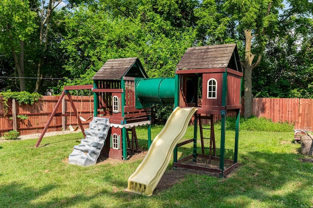 83 2nd St, Shelby, OH 44875 - view of jungle gym featuring a fenced backyard and view of wooded area
