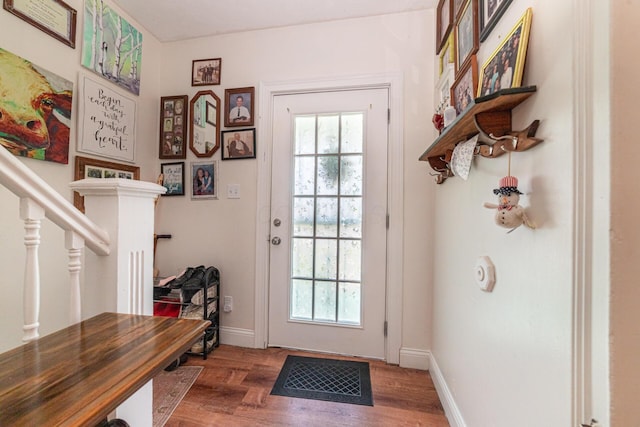 83 2nd St, Shelby, OH 44875 - entryway featuring healthy amount of natural light and wood finished floors