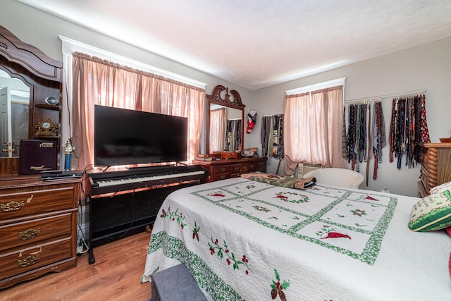 83 2nd St, Shelby, OH 44875 - bedroom with wood finished floors
